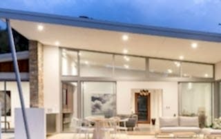 View into the living room of Perth home from the outdoor patio area
