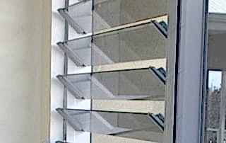 Silver aluminium louvre style window installed at home in Perth